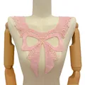 Detailed macro shot of pink milk silk embroidered lace fake collar with elegant bow design - Bow Knot Collar / Pink