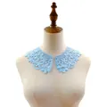 Close-up of light blue water-soluble lace floral collar accessory on mannequin for DIY sewing - Sky Blue
