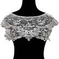 Detailed white water-soluble lace collar embroidery on black mannequin bust - White
