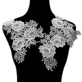 Detailed view of white floral lace applique with 3D embroidery on a black mannequin. - 1 Pair Pack / White