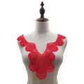 Detailed view of a red floral water-soluble lace collar applique on a mannequin. - Red