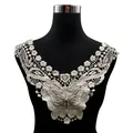 Detailed view of beige water-soluble lace collar with butterfly and floral embroidery - Apricot