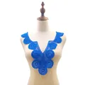 Close-up of bright blue water-soluble lace V-neck collar applique on a mannequin - Blue