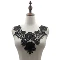 Elegant black water-soluble lace floral collar appliqué detail on a tailor's mannequin - Black