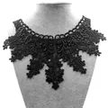 Close-up of black water-soluble lace collar embroidery on display mannequin bust. - Black