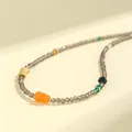 Collar artesanal de cuentas de cuarzo ahumado facetado de 3 mm con colgante de jade naranja - Collar de Cuarzo Ahumado Facetado con Calabaza de Jade