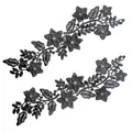 Close-up of black 3D water-soluble lace floral appliques for fashion accessories. - Black