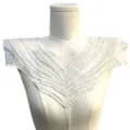 Detailed view of white water-soluble embroidered V-shaped lace collar trim on a mannequin - White