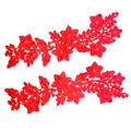 Detailed view of red water-soluble lace floral appliques with hollow embroidery - Red