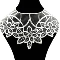 Close-up detail of white water-soluble lace embroidery flower collar with mesh base - White