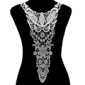 Macro detail of white water-soluble lace floral embroidery applique for dress decoration - White