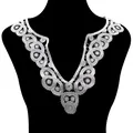 Detailed view of white water-soluble lace floral embroidery V-neck collar appliqué - White