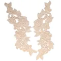 Detail view of symmetrical beige water-soluble lace floral appliques for DIY crafts - Beige