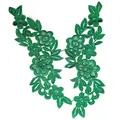 Detailed macro view of green water-soluble embroidered floral lace patches for DIY - Green