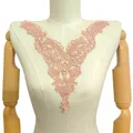 Detailed view of pink water-soluble lace floral applique collar on mannequin - Blush