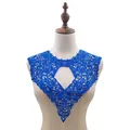 Close-up detail view of royal blue embroidered water-soluble lace collar on mannequin display - Blue