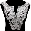 Detail showing intricate white milk silk embroidered lace collar applique for clothing - White