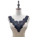 Detailed view of elegant black lace embroidery neckline applique on mannequin. - Black