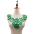 Detailed view of bright green water-soluble floral lace collar on clothing mannequin torso - Green