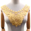 Detailed view of intricate yellow water-soluble lace collar with floral embroidery - Yellow
