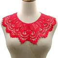 Detailed view of red water-soluble lace collar with intricate hollow-out floral embroidery - Red