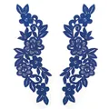 Detailed macro view of royal blue floral embroidery lace appliques on white background - Dark Blue