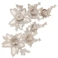 Detailed macro view of 3D beige floral embroidered water-soluble lace patches - Symmetric Floral Pair / Beige