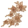 Detailed view of champagne gold 3D floral lace applique with intricate embroidery. - Symmetric Floral Pair / Golden Coffee