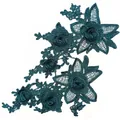 Macro view of dark green 3D embroidered lace applique with intricate floral details - Symmetric Floral Pair / Dark Green