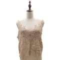 Detailed view of apricot water-soluble lace vest with delicate embroidery pattern - One Size / Tops / Light Coffee