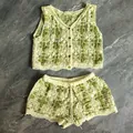 Detailed view of the bohemian floral crochet knit two-piece vest and shorts set - Top And Bottom / Green