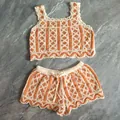 Detail of boho crochet two-piece set with orange diamond knit pattern - Top And Bottom / Orange