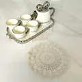 Detailed view of the intricate crochet pattern on the round vintage lace table mat - Radiant Petal Style (1#) / Diameter 23cm
