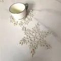 Detailed view of handmade crocheted cotton snowflake coaster on marble surface - Style 83# Snowflake / Diameter 17cm / Apricot