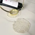 Macro detail of a vintage hollow embroidery lace coaster on a marble surface decor - Style 88# / Diameter 15.5cm / Apricot