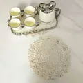 Vintage style hollow round crochet lace placemat on a white marble table - Multi-Layer Radiant Style (4#) / Diameter 28cm