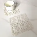 Detail view of a vintage cream lace hollow embroidered cotton square coaster - Round Heavyweight Hand Crochet Coaster (16)