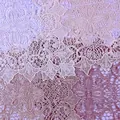 Detailed view of elegant lace embroidered hollow coasters in various pink and beige tones - Square 36cm / Dusty Pink