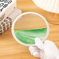 Detalle de arte de arena movediza 3D circular con arena verde y dorada - Green sand table [without base]