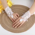 Elegant white lace wedding gloves with floral embroidery and rhinestones for brides - One Size / White