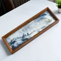 Vista detallada de una obra de arte rectangular de arena movediza 3D con marco de madera - Tamaño 36x12x3 / Negro