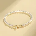 Elegant minimalist white pearl beaded bracelet with a gold-toned spring ring clasp - 14cm / 4mm