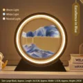 Lámpara circular grande de pintura de arena movediza negra con arena azul y aro LED ajustable - Batería Seca/Enchufe / 12 Pulgadas / Marco Negro Arena Azul