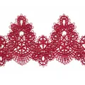Detailed view of red water-soluble lace trim with intricate embroidery DIY accessory - Burgundy