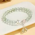 Elegant rose quartz and green prehnite beaded bracelet featuring a butterfly charm - Prehnite Rose Quartz Butterfly Style