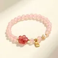 Elegante braccialetto di perle di cristallo rosa con fiore di fragola e ciondolo perla - Bracciale con Targhetta Carattere Fu / Quarzo rosa