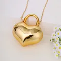 Elegante herzförmige glänzende goldene Acryl-Mini-Kettenumhängetasche für modebewusste Damen - Gold