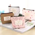Vue détaillée de plusieurs porte-monnaie en toile à motifs floraux avec fermeture éclair - Mixed Color Style