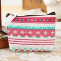 Detail view of the woven geometric pattern on the vintage linen coin purse - Ethnic