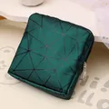 Tragbare dunkelgrüne Damenbinden-Tasche mit schwarzem geometrischem Muster für Damen - Metallblau